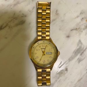 Gold women’s Fossil watch